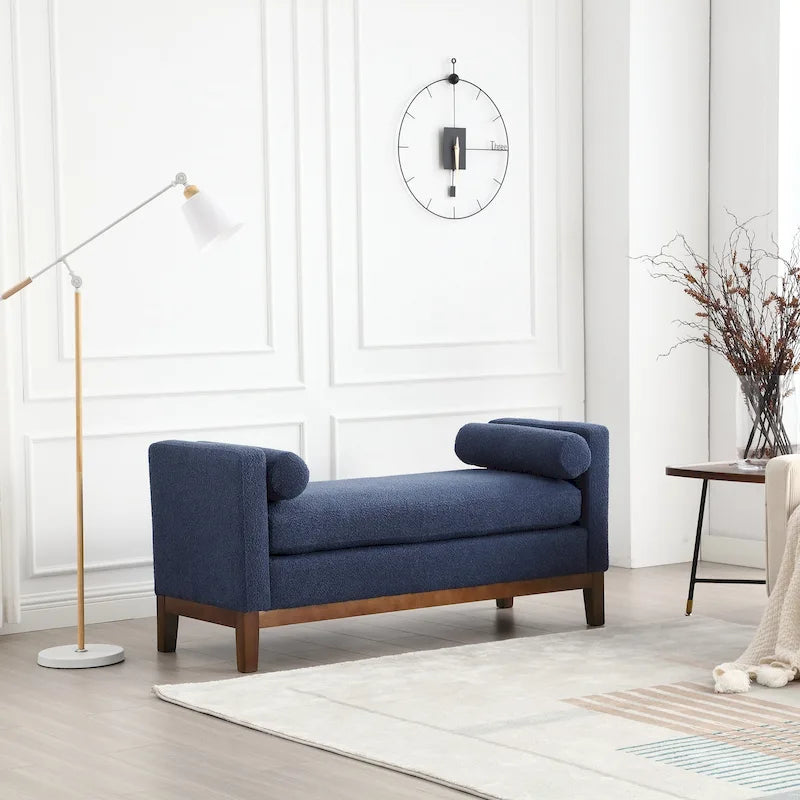 Banc/pouf élégant de 53,5 cm de large, capitonné, avec pieds en bois et coussins cylindriques, idéal pour le pied de lit, la chambre, le salon ou l'entrée.