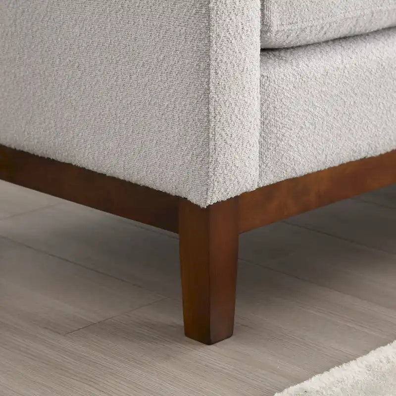 Banc/pouf élégant de 53,5 cm de large, capitonné, avec pieds en bois et coussins cylindriques, idéal pour le pied de lit, la chambre, le salon ou l'entrée.