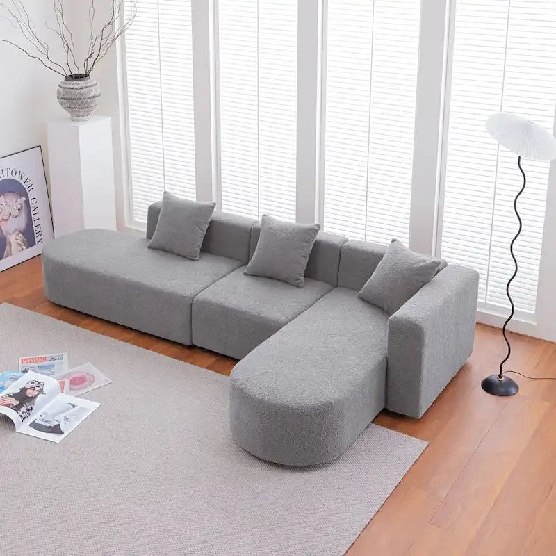 Canapé d'angle moderne en bouclette avec assise incurvée (orienté à droite)