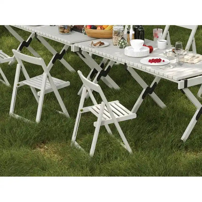 Ensemble de 2 chaises d'extérieur Stateside en bois résistant aux intempéries, pliables et compactes.
